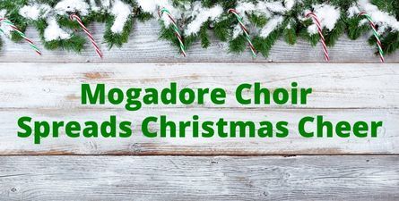 Green text: Mogadore Choir Spreads Christmas Cheer. Background graphic with Christmas garland and candy canes