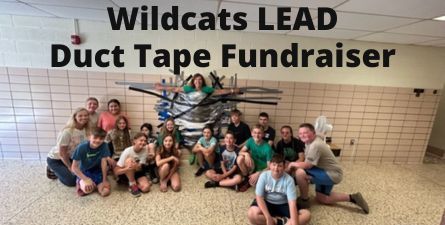 Black text: Wildcats LEAD Duct Tape Fundraiser, photo of students and principal taped to wall